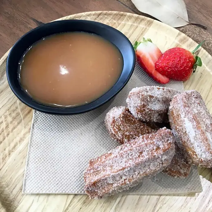 Chocolate churros with chocolate & salted caramel sauce (Spanish Dessert)